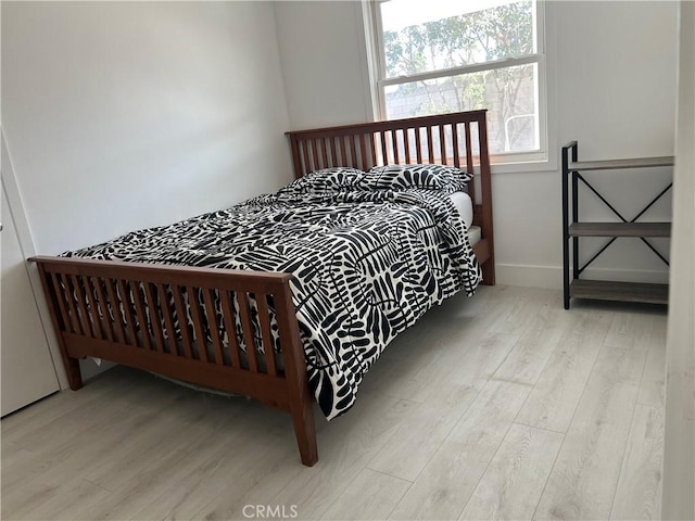 bedroom featuring light hardwood / wood-style flooring