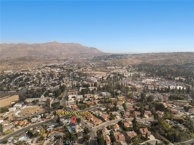 drone / aerial view featuring a mountain view