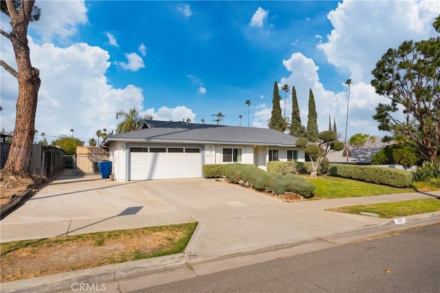 ranch-style house featuring a garage