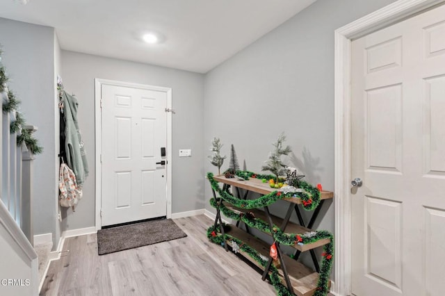 entrance foyer featuring light wood-type flooring