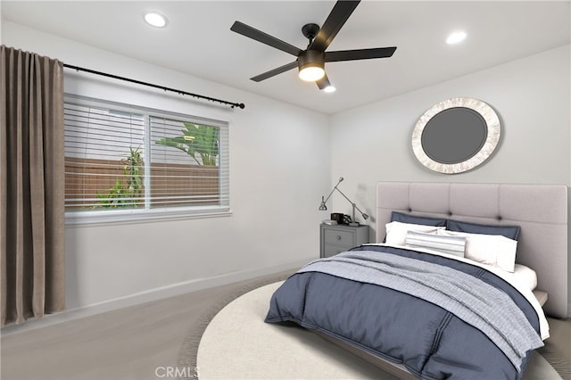 bedroom featuring wood-type flooring and ceiling fan