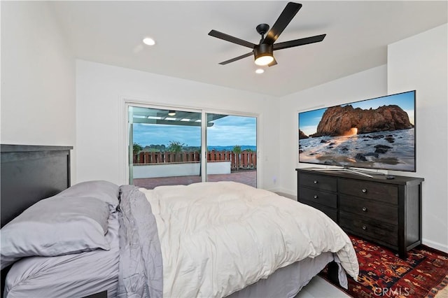 bedroom featuring access to exterior and ceiling fan