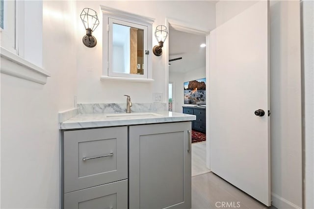 bathroom with vanity and tile patterned floors