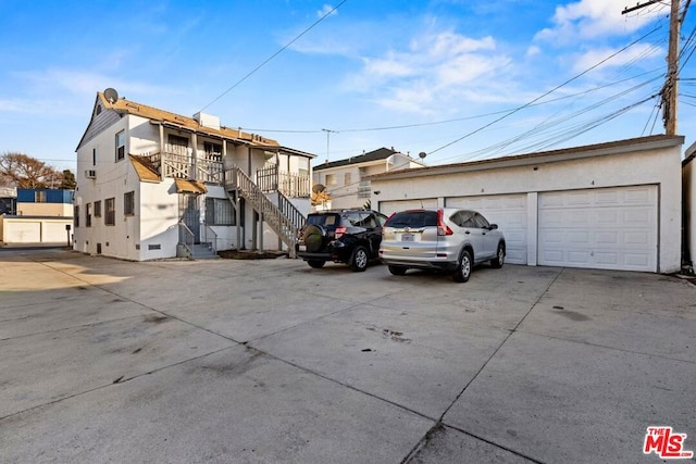 exterior space with a garage