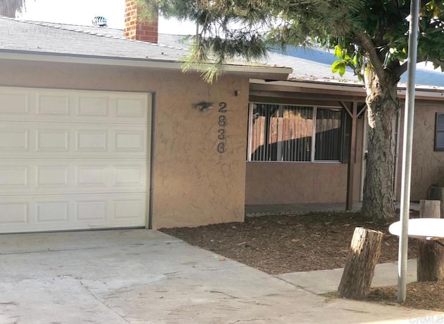 exterior space featuring a garage