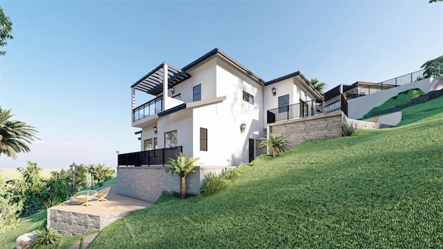 view of property exterior featuring a balcony, a patio area, and a lawn