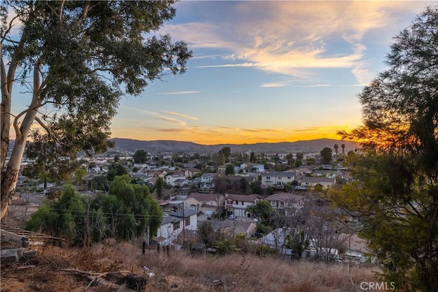 nature at dusk featuring a mountain view