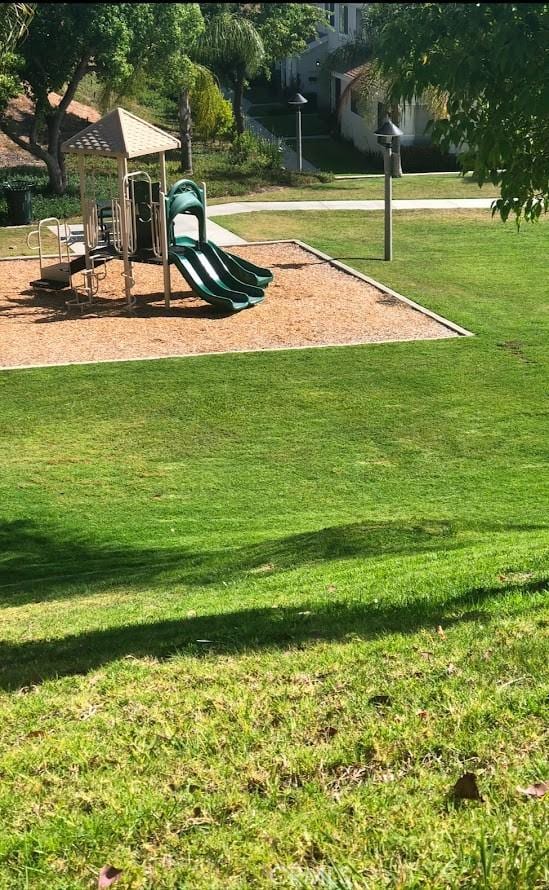 view of play area featuring a yard