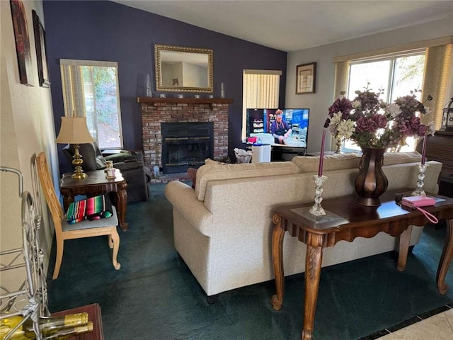 living room with a fireplace and vaulted ceiling