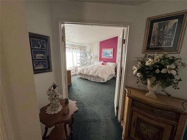 hallway featuring carpet flooring