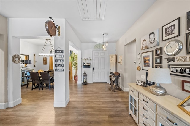 foyer entrance with hardwood / wood-style floors