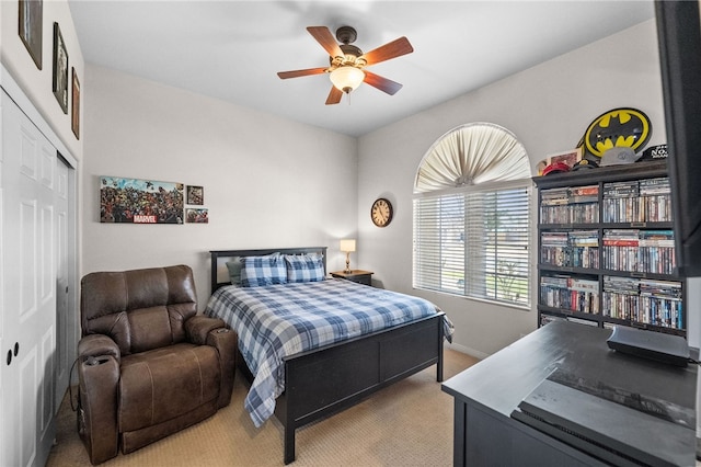 bedroom featuring carpet floors, a closet, and ceiling fan