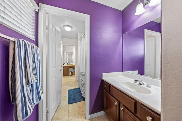 bathroom featuring vanity and tile patterned flooring