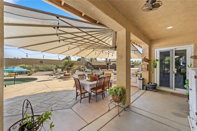 view of patio with an outdoor kitchen