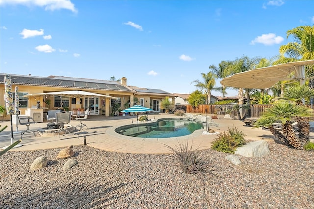 view of swimming pool featuring a patio area