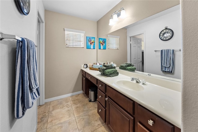 bathroom featuring vanity and tile patterned flooring