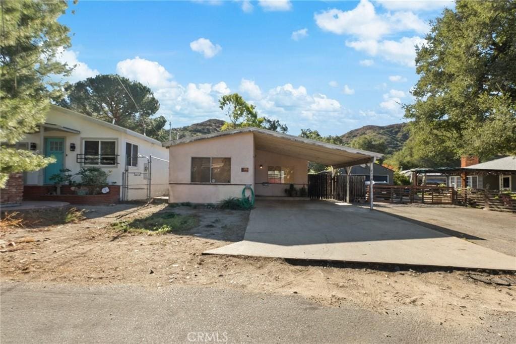 view of front of home featuring a mountain view