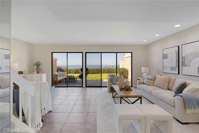 living room featuring recessed lighting and light tile patterned floors