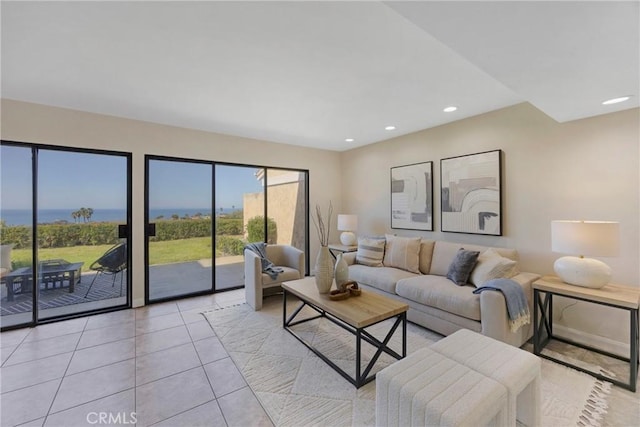 living room featuring light tile patterned floors and recessed lighting