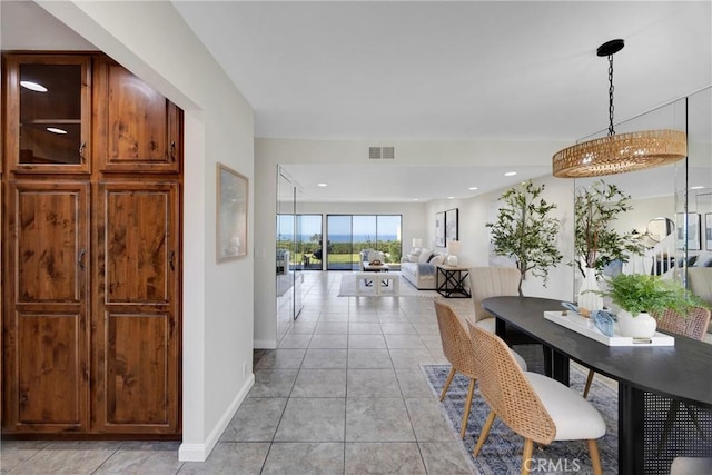 dining space with recessed lighting, light tile patterned flooring, visible vents, and baseboards