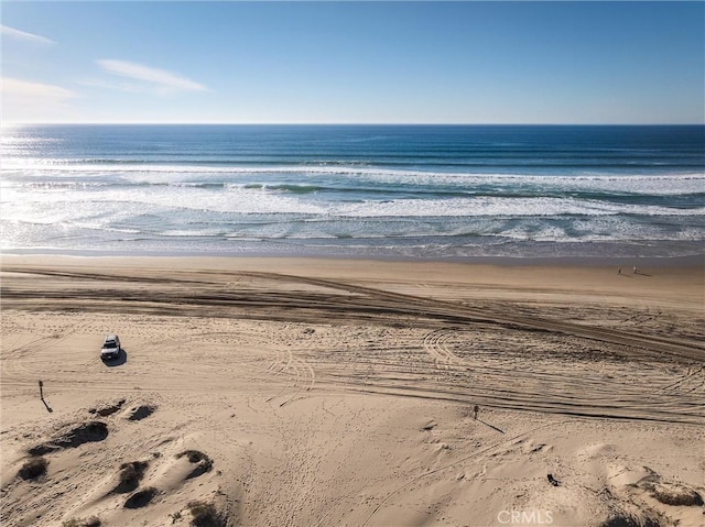 property view of water featuring a view of the beach