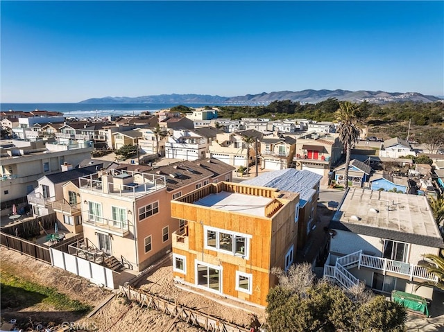 birds eye view of property featuring a mountain view