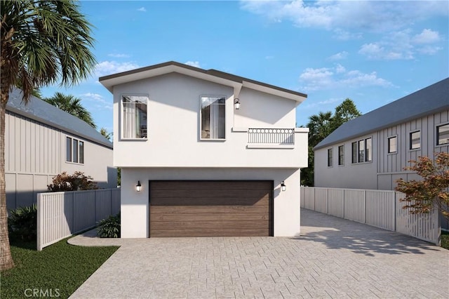 364 Mccarthy Ave, Oceano, CA 93445 - contemporary home featuring fence, a balcony, a garage, stucco siding, and decorative driveway