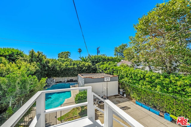 view of swimming pool featuring a patio