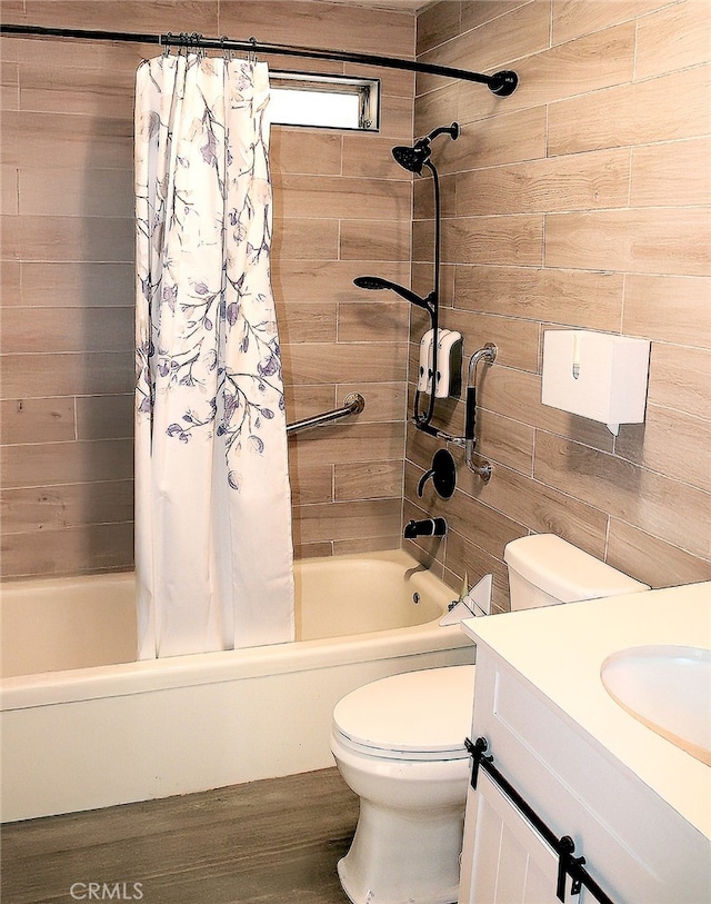 full bathroom with vanity, shower / bath combination with curtain, and toilet