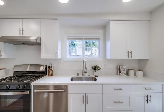 kitchen with white cabinetry, sink, and appliances with stainless steel finishes