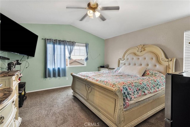 bedroom featuring vaulted ceiling, ceiling fan, and dark colored carpet