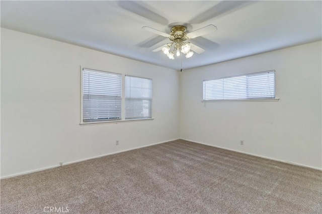 unfurnished room featuring carpet floors and ceiling fan