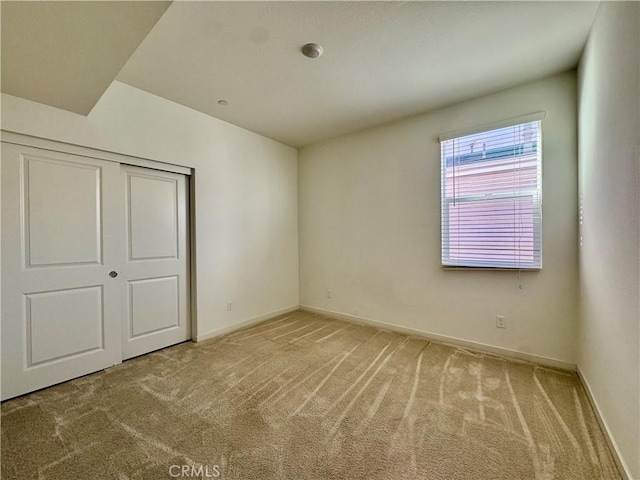148 Stage, Irvine, CA 92618 - unfurnished bedroom featuring a closet and carpet
