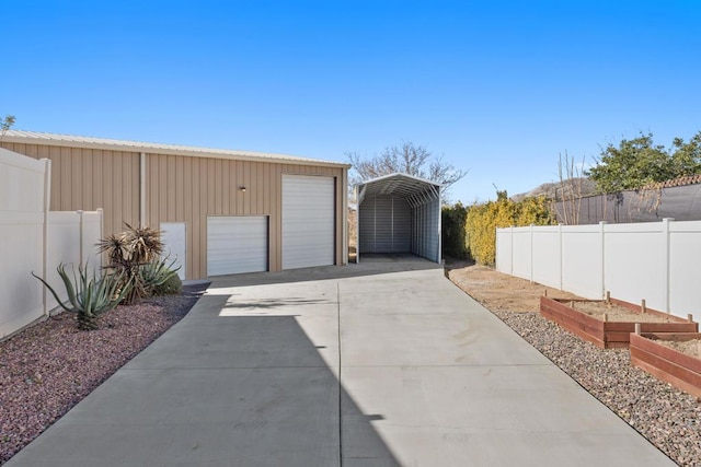 garage with a carport