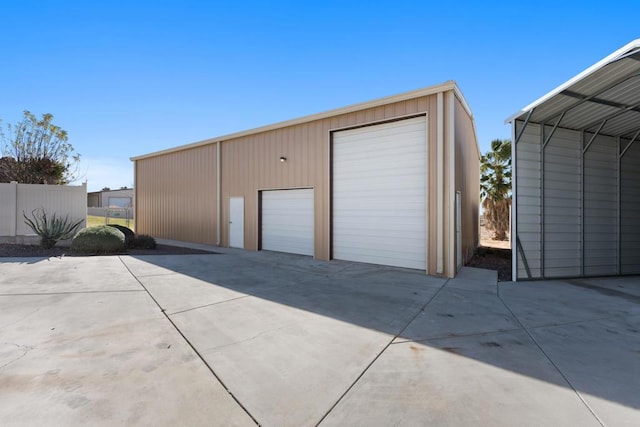 garage featuring a carport