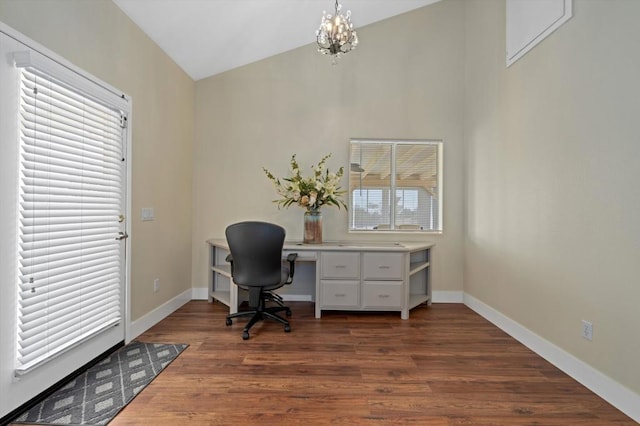 office with dark wood-type flooring, a chandelier, and vaulted ceiling