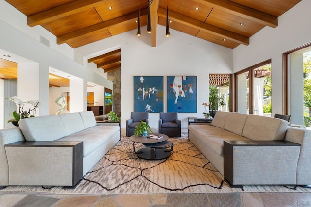 living room with beamed ceiling, high vaulted ceiling, and wood ceiling