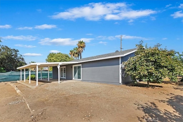 single story home featuring a patio area