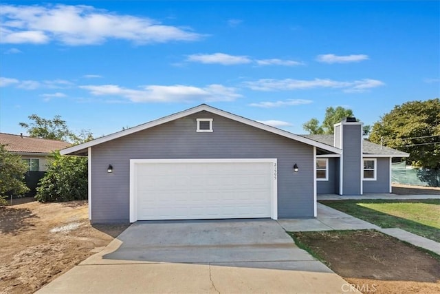 ranch-style house featuring a garage