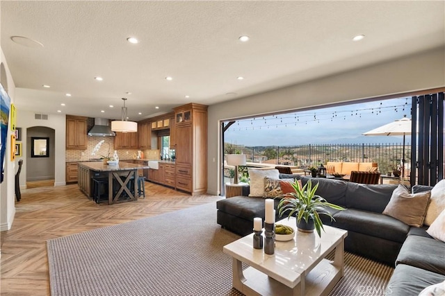 living room with light parquet floors