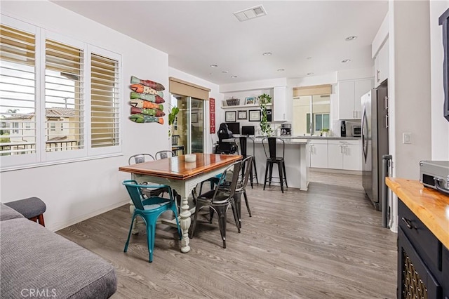 dining area featuring light hardwood / wood-style floors