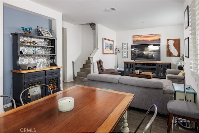 living room featuring dark hardwood / wood-style flooring