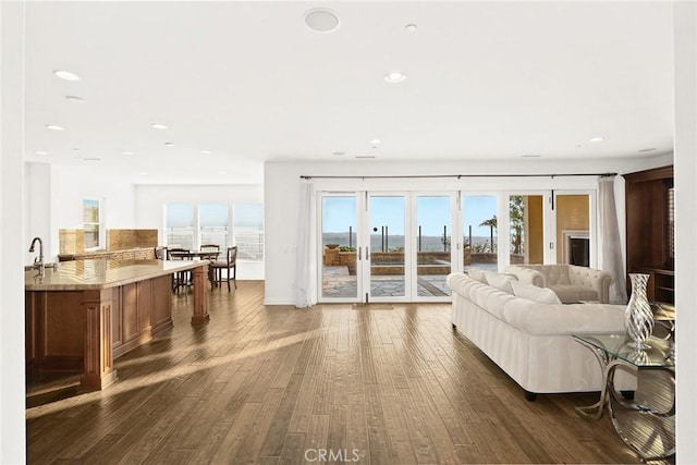 2598 E Temblor Ranch Dr, Brea, CA 92821 - living area featuring dark wood-style floors, recessed lighting, and french doors