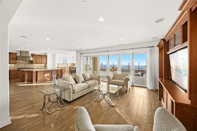 2598 E Temblor Ranch Dr, Brea, CA 92821 - living room featuring dark wood-style flooring and recessed lighting