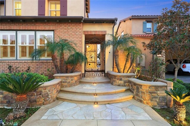 2598 E Temblor Ranch Dr, Brea, CA 92821 - entrance to property with brick siding and stucco siding