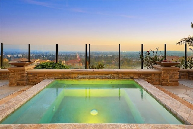 2598 E Temblor Ranch Dr, Brea, CA 92821 - pool at dusk featuring an outdoor pool