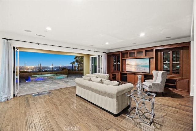 living room with light hardwood / wood-style floors