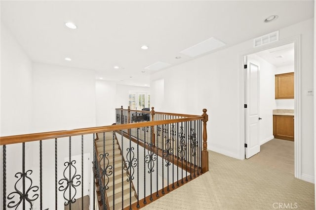 2598 E Temblor Ranch Dr, Brea, CA 92821 - hallway with an upstairs landing, light carpet, recessed lighting, and baseboards