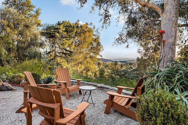 view of patio / terrace featuring a mountain view