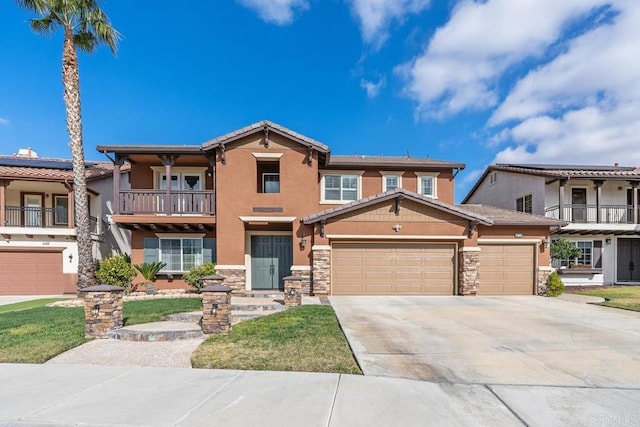 view of front of property with a garage and a balcony